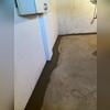 The finished installation shows how WaterGuard remains hidden while actively managing basement water.