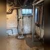 SmartSump was installed in the corner of the basement to reliably pump out moisture intrusion.