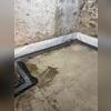 This in-progress look shows how WaterGuard remains hidden once the concrete is restored.
