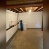 CleanSpace lines the basement walls to protect the space from dampness and humidity.