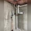 Our team established a dedicated extraction point to access the sub-slab soil where radon gas accumulates. A PVC vent pipe was securely connected to this point and routed through the home's exterior siding, creating a sealed pathway for radon to be drawn from beneath the foundation. This airtight...