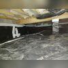 This old vapor barrier is clearly not working. Visible debris and high humidity levels let us know this crawl space is not properly insulated.