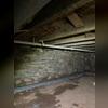 WaterGuard was installed around the perimeter of the crawl space to direct any seeping water to the sump pump for removal.