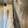 WaterGuard was installed around the perimeter of the basement to direct groundwater to the sump pump for removal.