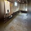 WaterGuard was installed to capture and redirect water to the sump pump for removal.