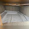 Vapor barrier ran in crawlspace and sealed to foundation wall