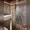 The crack in Frank's basement wall was leaking, causing damage in its wake. The walls and floors had begun to discolor and stain from constant moisture.