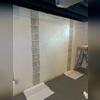 Prepping the basement walls for CarbonArmor installation.