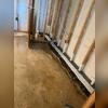 This photo shows WaterGuard being installed as part of a customized basement waterproofing solution.