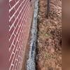 Our Foundation Drain is place down near the footers of the building and covered in rock to help filter out foreign materials and stop the drain from clogging.