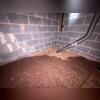This photo shows the crawl space before Encapsulation.