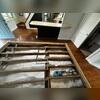 With the crawl space exposed from above, the crew could more easily install the CleanSpace liner and sump pump.