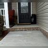 After the PolyLyft&trade; process, the concrete walkway was lifted and stabilized, restoring a more even and secure entryway for the homeowner.