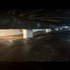 Drainage matting forms a permanent seal for leaking crawl space floors.