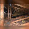 This attic was a bit of a mess. The fiberglass insulation had become thin, aged, and was falling apart.