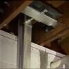 The PowerBrace upper bracket attaches to the floor joists above and it can be tightened to reverse the inward bowing of the wall that has already happened.