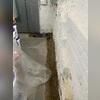 Our certified specialists are preparing the foundation for professional waterproofing.