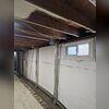 These braces will strengthen and reinforce the basement wall.