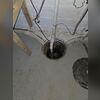 Kevin's basement waterproofing system used to consist of a cove drain and an outdated sump pump. If water seeped in, it would flow into the shallow trench around the basement and then into the sump pump.