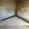 The interior drainage system is complete, capturing water at its source to prevent flooding. Installed below the concrete, it protects basements from water damage quietly and efficiently.