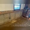 This photo shows evidence of moisture along the foundation.