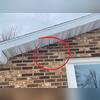 This circle highlights on of the many cracks in the brick exterior. Often the first place to crack due to settling is from the corners of windows. Windows and doors are often the weakest parts in a wall, and so they are the first to crack. This window in the bottom right corner of the photo was...