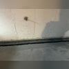 The system is visible here before covering, ready to capture water and direct it to the sump pump.