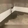 CleanSpace is a strong vapor barrier that lines the bottom part of the basement walls to direct seepage into the WaterGuard drainage system. WaterGuard is installed along the perimeter of the basement floor and covered in fresh concrete to provide a seamless finished look once it's dry.