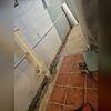 Damp corners and musty odors show why this basement required a full waterproofing solution.