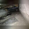 Before photos reveal the combination of water, dampness, and uneven surfaces in this space.