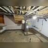 Installation complete: WaterGuard protects the basement by managing water flow effectively.