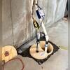 This image is of our WaterGuard drainage system before it is covered in fresh concrete. The WaterGuard lines the basement floor's perimeter and channels groundwater into the TripleSafe sump pump.