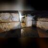 This basement shows the area where water intrusion has been causing damp walls and floor damage.