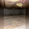 The damp and unsealed crawl space.