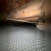 Drainage matting forms a permanent seal for leaking crawl space floors.