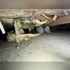 The space shows signs of mold, decay, and insufficient airflow before remediation.
