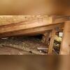 The old insulation in this attic was falling apart. It was very thin and not insulating the space very well.