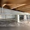 This vapor barrier system isolates the home from the harmful effects of ground moisture.