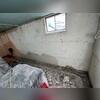 To being the project, we first moved all items six feet away from the perimeter of the basement, and then we sealed the items with a plastic tarp. We then jackhammered the floor slab around the perimeter of the basement to make room for our drainage system. After this photo was taken, we then...