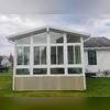 A 16 x 16 cathedral sunroom with option Bamboo plank ceiling.