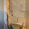Water-saturated soil can sometimes exert enough pressure to cause foundation walls to bow, bulge or tilt.