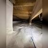 After installation, the crawl space is fully encapsulated, bright, and dry, providing long term protection for the home and improved air quality above.