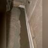 The system is hidden beneath the concrete but keeps the basement protected.