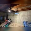 The small window in this basement wasn't letting in enough light.