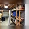 These are what the basement walls looked like before our team stabilized them. The shelves along these walls could become compromsied over time due to the walls not being stable. Of course the shelves had to be moved so our team could work.
