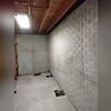 Parts of the concrete slab was removed in order to install the PowerBrace Foundation Wall Repair System properly.