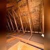 This attic was in serious need of insulation.