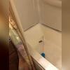 Prior to the remodel, this old, outdated tub had failing surround, constant discoloration, and mold and mildew buildup.