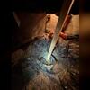 The vapor barrier inside of this crawl space was very dirty, and there was also hanging subfloor insulation - both evidence of water damage.