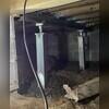 The SmartJack Stabilizing System adds immediate support to the home through the crawl space. The SmartJacks can even be adjusted to lift the floor above back to its original position.